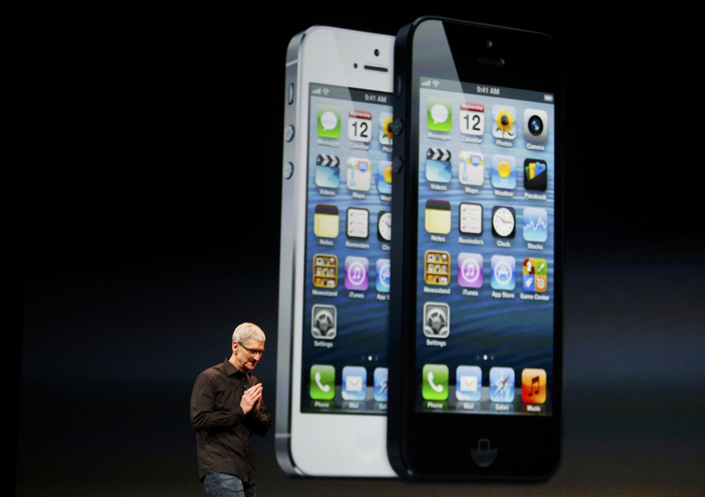 Apple Inc. CEO Tim Cook takes the stage after the introduction of the iPhone 5 during Apple Inc.