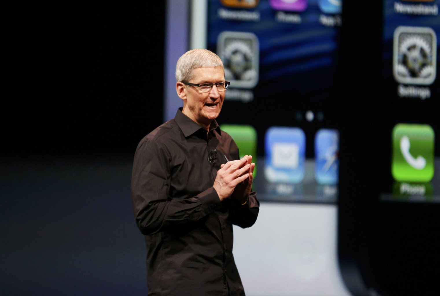 Apple Inc. CEO Tim Cook takes the stage after the introduction of the iPhone 5 during Apple Inc.