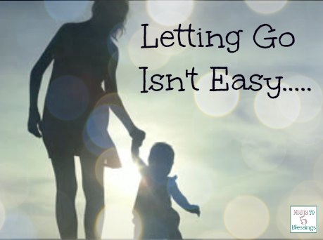 mother-and-child-silhouette-button