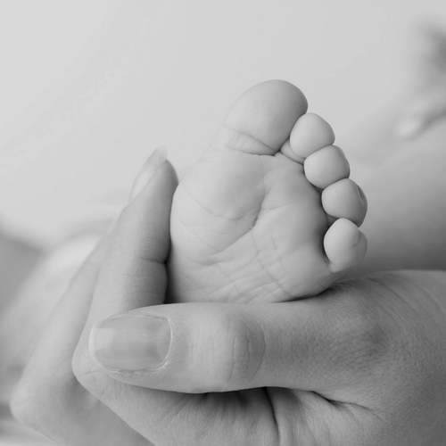 Holding Baby's Foot.jpg
