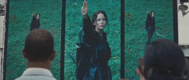 Hunger-Games-Movie-Katniss-Sign-1024x434 Hunger-Games-Movie-Katniss-Sign-1024x434