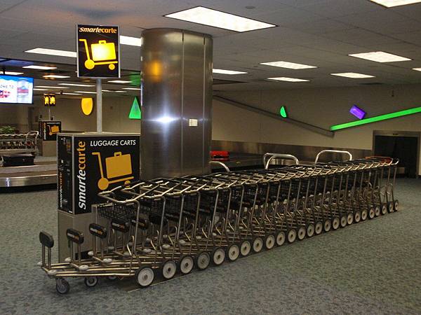That__s_a_LOT_of_Luggage_Carts_by_DreamsWithinMe.jpg