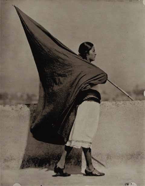 ---Tina Modotti, Woman with Flag, 1928--