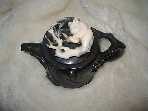 中國貓熊團團圓圓形狀之台灣南投埔里巧雕黑膽石壺 卡哇伊 中國貓熊團團圓圓形狀之台灣南投埔里巧雕黑膽石壺 卡哇伊