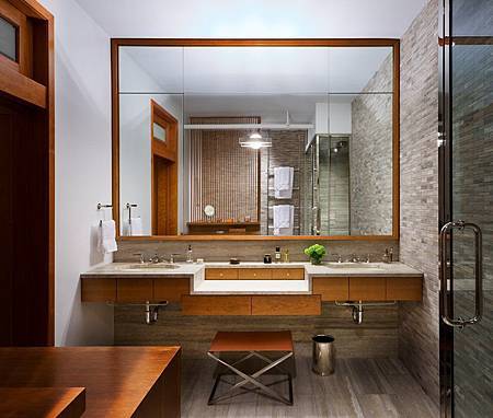 Brick-Wall-Studio-Apartment-by-Stephan-JAKLITSCH-GARDNER-elemental-wooden-framed-bathroom-with-stone-feature-wall.jpeg