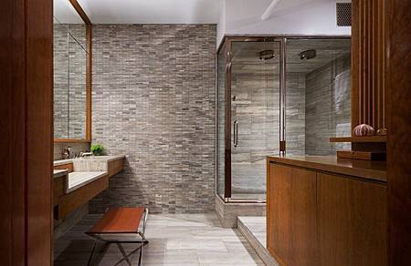 Brick-Wall-Studio-Apartment-by-Stephan-JAKLITSCH-GARDNER-elemental-wooden-framed-bathroom-with-stone-feature-wall-and-double-shower.jpeg