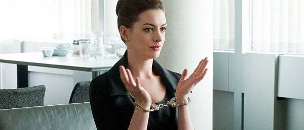 annehathaway-darkknightrises-handcuffed-700x300.jpg