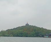 西湖與花港觀魚,不只想起了那個春節,還想起了德布西的金魚