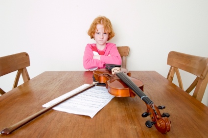 an angry girl with her violin