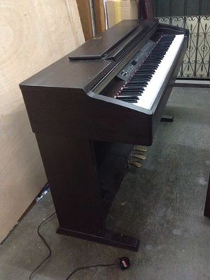 高雄鋼琴調音搬運維修回收購中古YAMAHA數位鋼琴二手KAWAI電子琴Roland