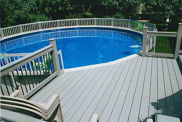 Round-above-ground-composite-pool-with-decks-railing.jpg Round-above-ground-composite-pool-with-decks-railing.jpg