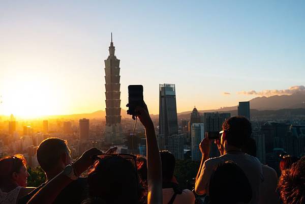 people-taking-photos-of-high-rise-buildings-1492239.jpg