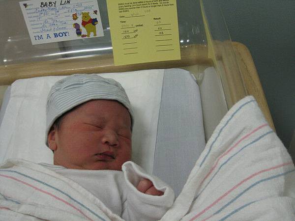 Birth card shows I am his mon