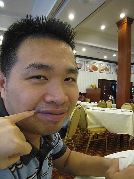 被說笑一下來一張 表情搞得好奸詐