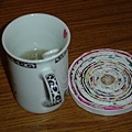 Hand-made cup pad 1 dollar.JPG