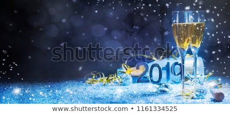 sparkling-new-year-background-champagne-450w-1161334525.jpg