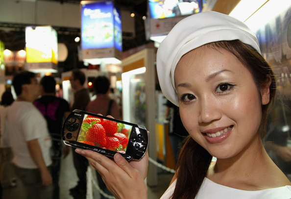 A model displays Sony Computer Entertainment's new PlayStation Portable (PSP-3000).bmp