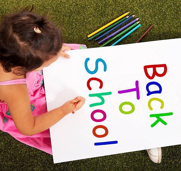 girl-writing-back-to-school-as-symbol-for-education_z1OukBPu.jpg