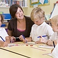 schoolchildren-and-their-teacher-in-a-primary-class_BYboUACHi.jpg