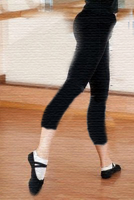 young-ballerina-in-black-pointes-on-parquet.jpg