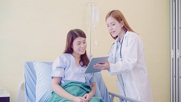 beautiful-smart-asian-doctor-patient-discussing-explaining-something-with-tablet.jpg