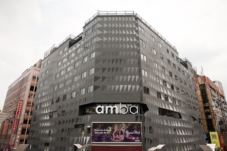 amba-TAIPEI-XIMENDING-features-a-modern-charcoal-grey-exterior-in-a-triangular-pattern-derived-from-computerised-scripting