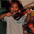姐姐也拿起小提琴拉了起來