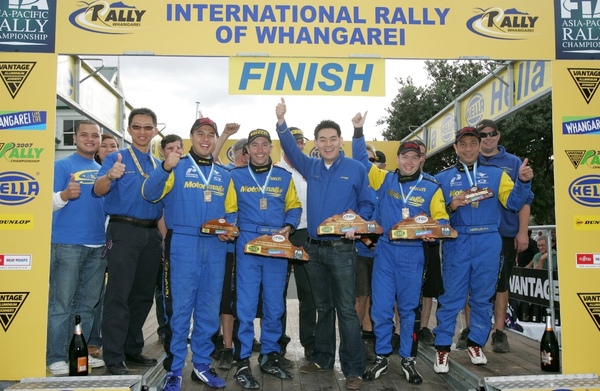 APRC07-NZ- Team celebration with Podium - Raw -LINEAR-1.jpg