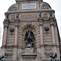 eh....  some plaza near St Michel and the sculpture is about St Michel again!~