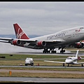 Virgin Atlantic Airways B747-443(G-VROS)@MAN_2(2)_20120222.jpg