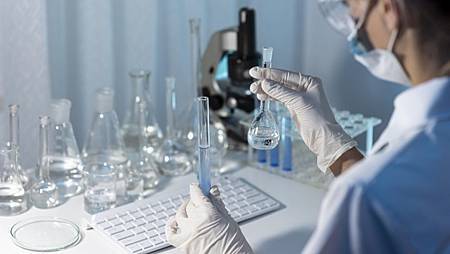 close-up-researcher-holding-glassware_23-2148794430.jpg