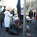 This vendor in white was singing & dancing while peddling!