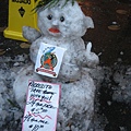 Snowman in the roadside