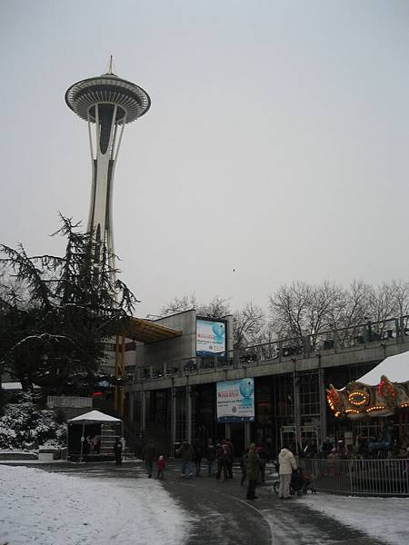 A MIX of Space Needle, Ice Rink, carousel & Ice Sculpting