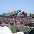 A play structure constructed within a huge Coca Cola bottle for kids & the world's LARGEST baseball glove