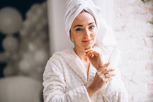 woman-bathrobe-with-body-lotion.jpg