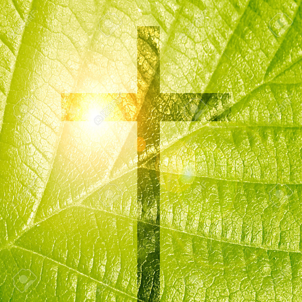 0-2 glowing-christian-cross-on-a-green-nature.jpg