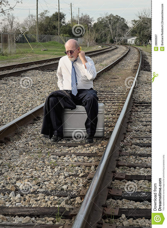 tired-jobless-senior-businessman-sits-suitcase-train-track-28903507