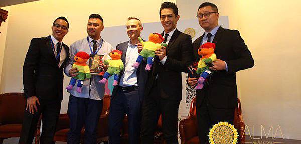 corporate-award-recipients-holding-teddybears.jpg