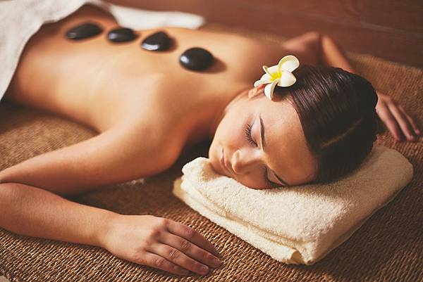 woman-enjoying-stone-massage (1) (1).jpg