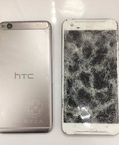 HTC X9面板破裂.jpg HTC X9面板破裂.jpg