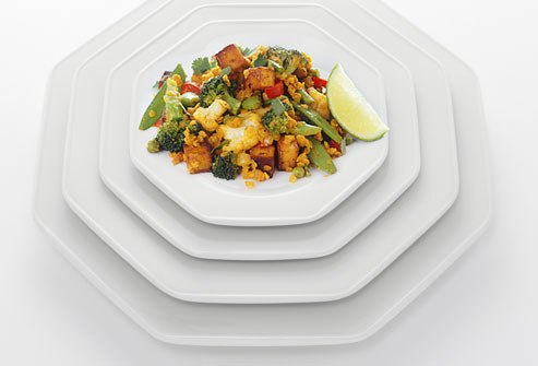 getty_rm_photo_of_composite_of_stirfry_on_stack_of_plates