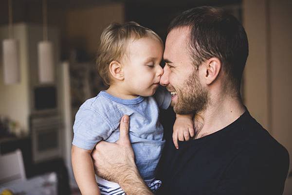 father-and-son-playing-with-their-noses_23-2147615929.jpg