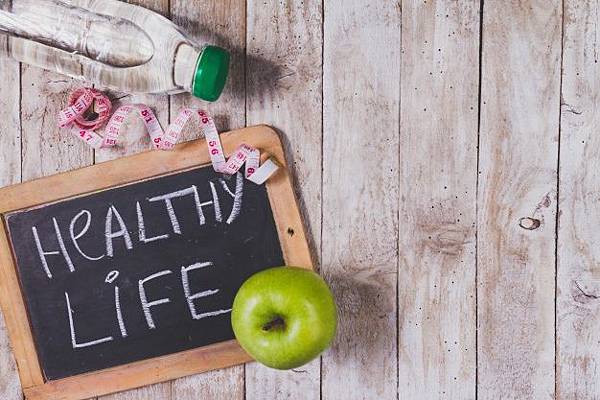 top-view-of-wooden-surface-with-slate-apple-and-water-bottle_23-2147601736.jpg