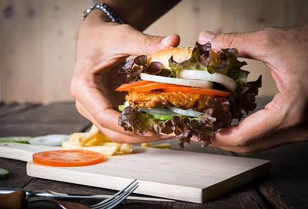 man-holds-burger-with-hands-and-potato-chip_1150-1862.jpg man-holds-burger-with-hands-and-potato-chip_1150-1862.jpg
