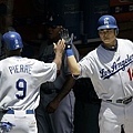 080502 Juan Pierre gets a high-five from teammate Chin-lung Hu.jpg