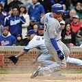 080528 James Loney safely crosses home plate as Chicago Cubs pitcher Sean Gallagher stops the ball.j