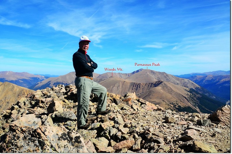 On the summit of Pettingell, in the background are Woods Mt. & Mount Parnassus