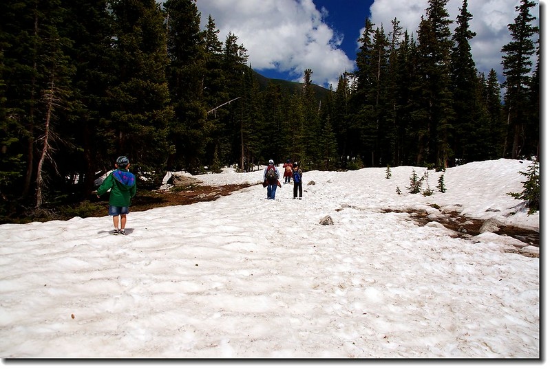 The trail to the lake was still covered in snow 1