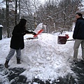 People were busy shovelling snow